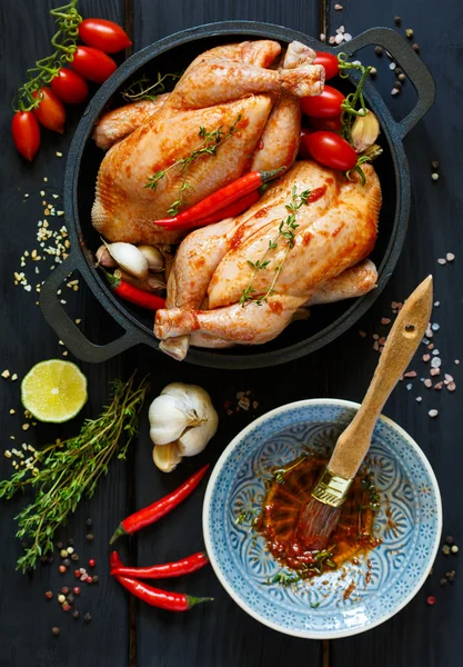 Preparation for roasting chicken with herbs — Stock Photo, Image