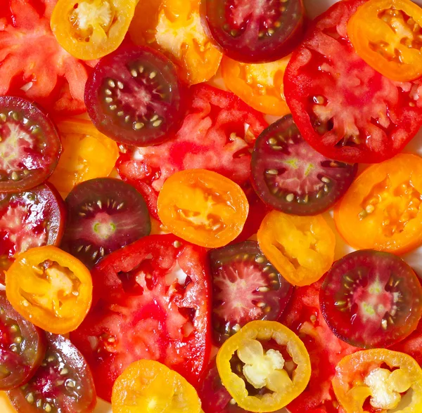 Tomater. Veggie bakgrund. — Stockfoto