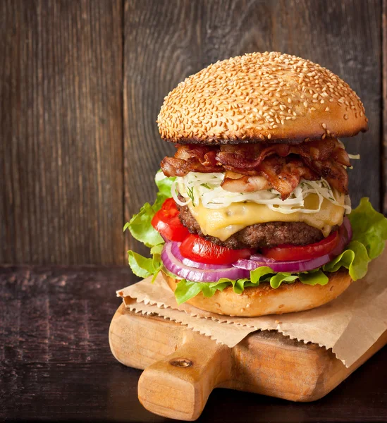 Big delicious cheeseburger. Royalty Free Stock Images