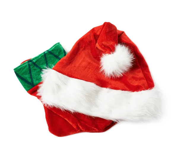 Santas hat and Christmas stocking isolated — Stock Photo, Image