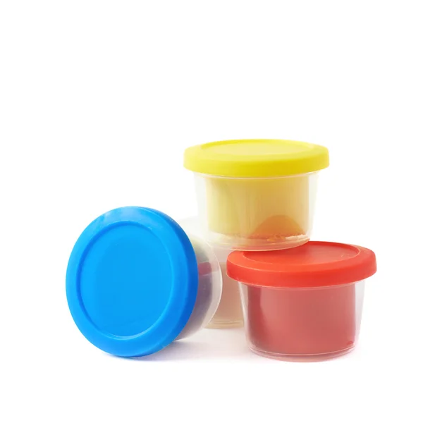 Pile of modeling clay boxes isolated Stock Photo by ©nbvf89 96773500