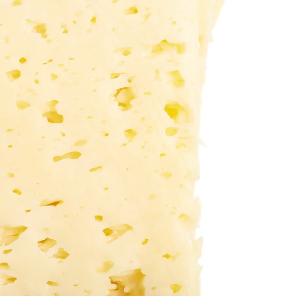 Close-up fragment of a cheeses slice — Stock Photo, Image