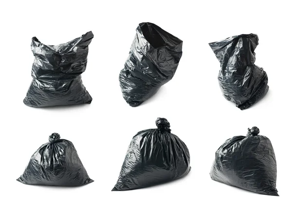 Filled black plastic garbage bag isolated — Stock Photo, Image