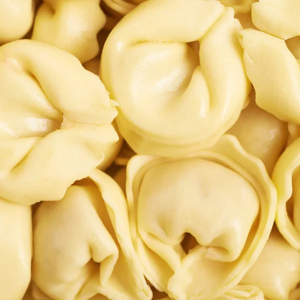 Surface covered with ravioli — Stock Photo, Image