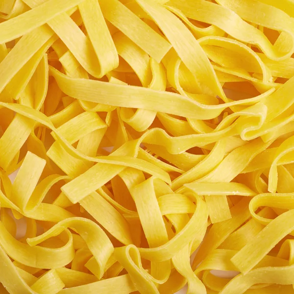 Oppervlak bedekt met pasta — Stockfoto