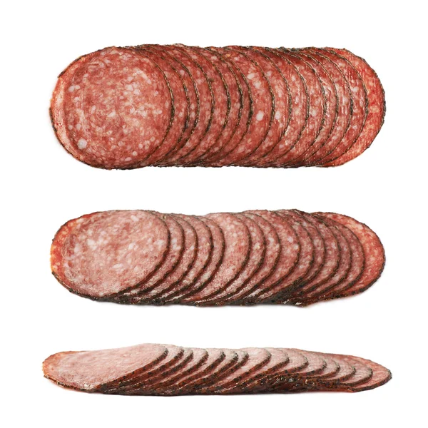 Pilha de várias fatias de salame isoladas — Fotografia de Stock