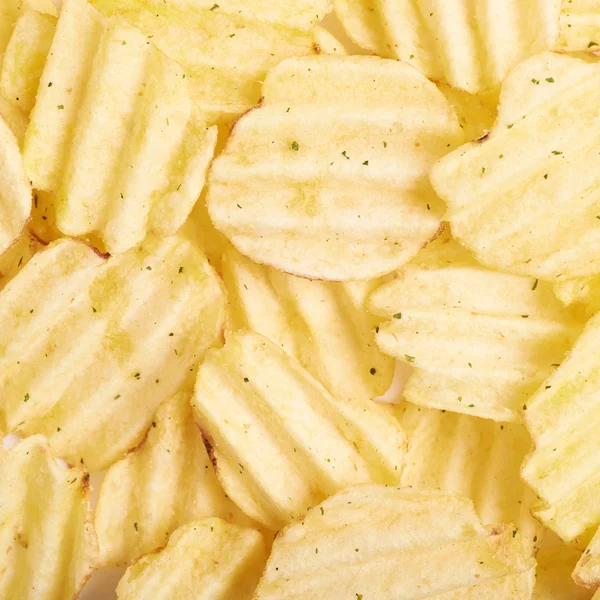 Ytan täcks med potatischips — Stockfoto