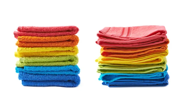 Pile of rainbow colored towels isolated — Stock Photo, Image