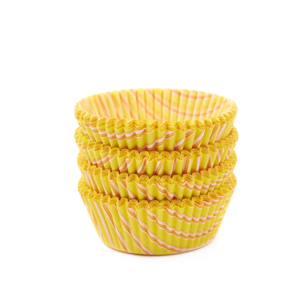 Coupe cupcake en papier jaune isolé — Photo