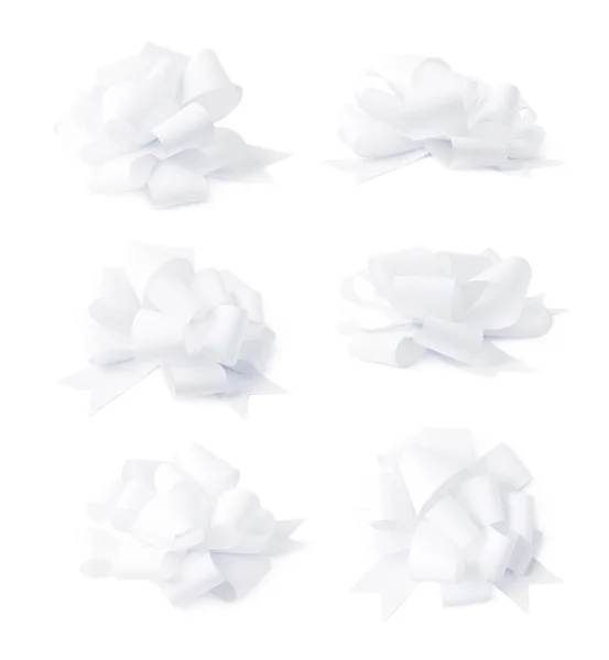 Pewien dekorujący wstążka łuk prezent na białym tle — Zdjęcie stockowe
