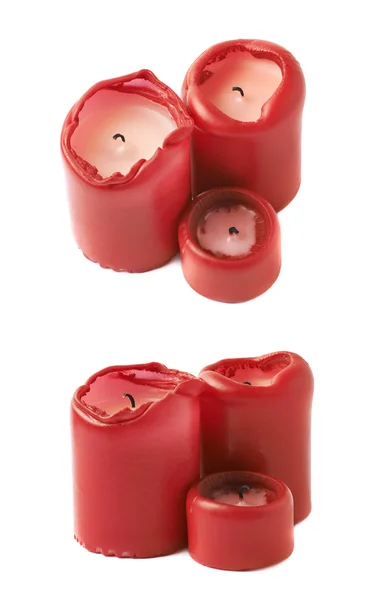 Três velas vermelhas isoladas — Fotografia de Stock