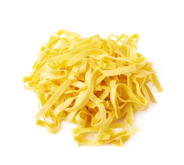 Haufen fettuccine Bandnudeln — Stockfoto