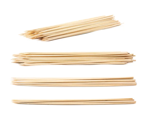 Pile of wooden skewers isolated — Stock Photo, Image