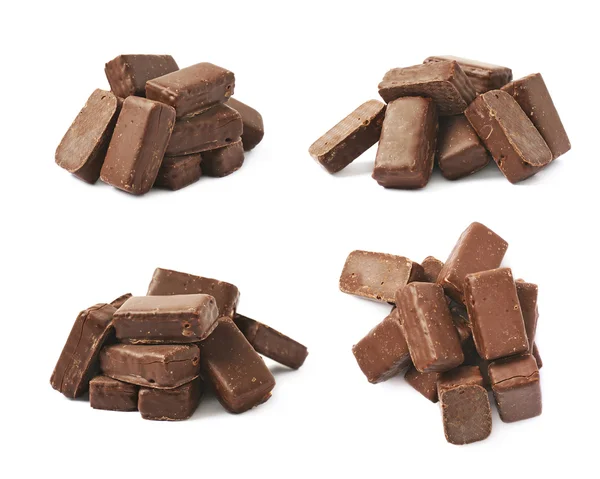 Hög med choklad godis isolerade — Stockfoto