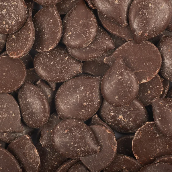 Oberfläche mit Schokoladenstücken bedeckt — Stockfoto