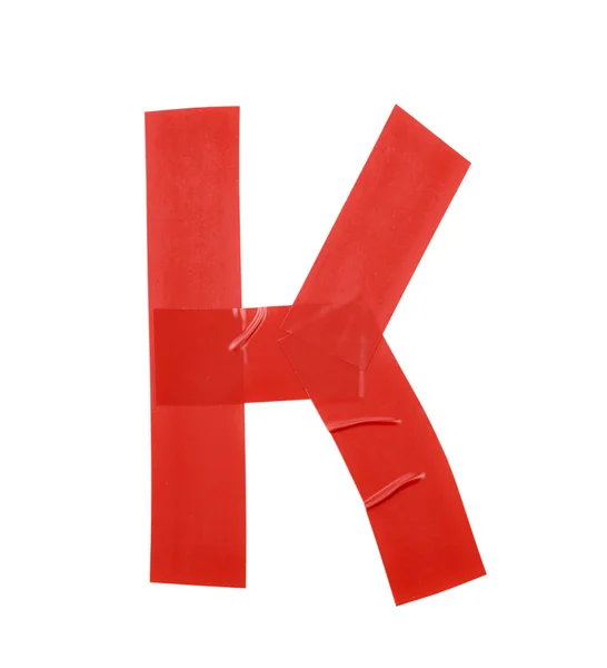 A K betűs szimbólum készült szigetelő szalag — Stock Fotó