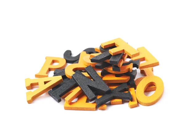Mucchio di lettere di legno dipinte isolato — Foto Stock