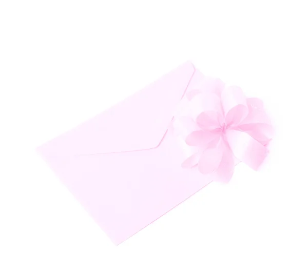 Бумажный конверт, украшенный бантом — стоковое фото