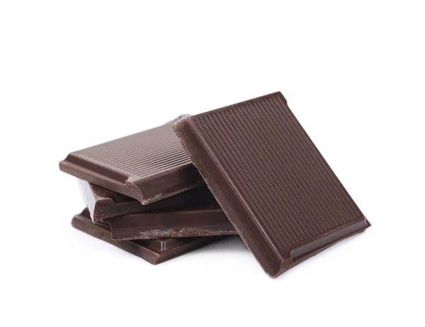 Pile de morceaux de barres de chocolat isolés — Photo