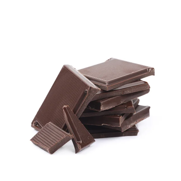 Pile de morceaux de barres de chocolat isolés — Photo