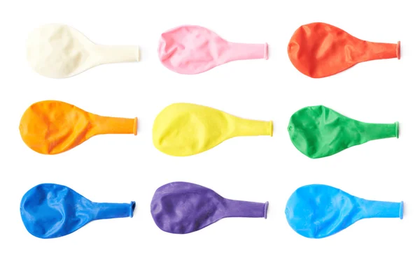 Conjunto de balões de ar deflacionados isolados — Fotografia de Stock
