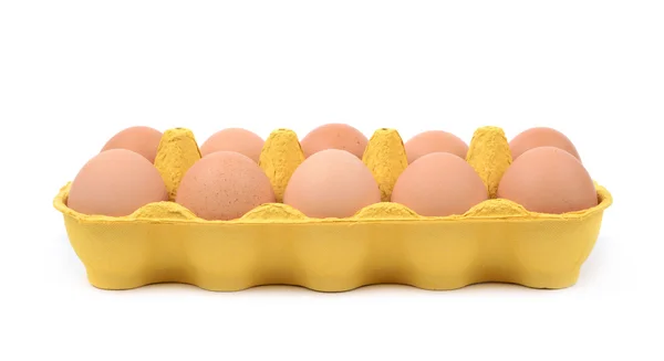Caja de huevo amarillo aislada — Foto de Stock