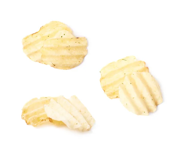 Несколько изолированных картофельных чипсов — стоковое фото