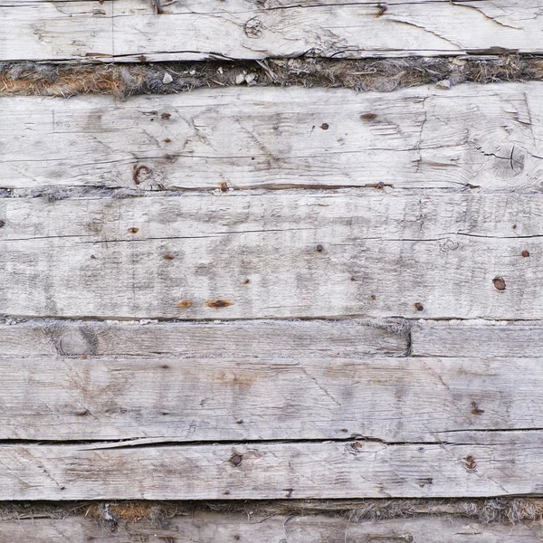 Fragment van een oude houten muur — Stockfoto