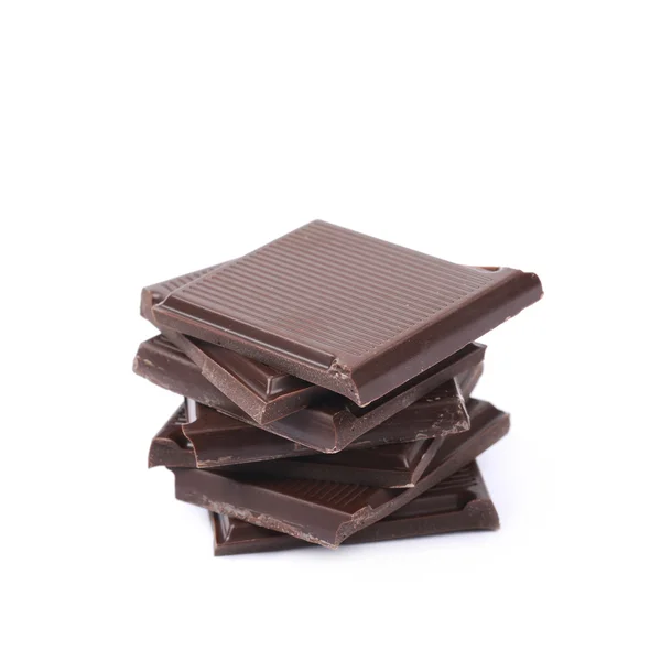 Σωρό κομμάτια σοκολάτα απομονωθεί — Φωτογραφία Αρχείου