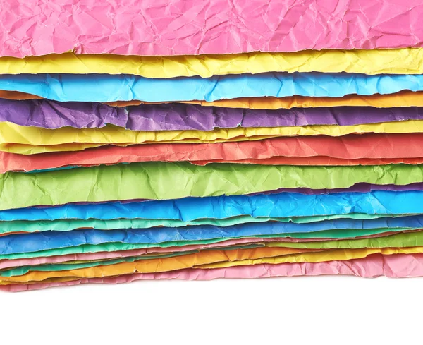 Stapel van kleurrijke verfrommeld vellen — Stockfoto