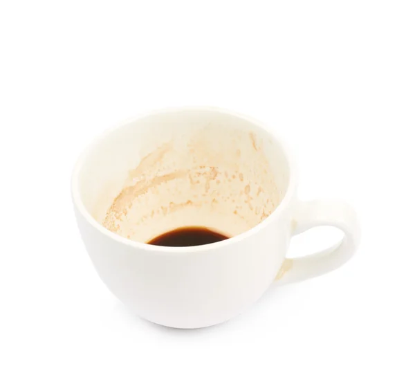 Cup with coffee leftovers isolated — Stock Photo, Image