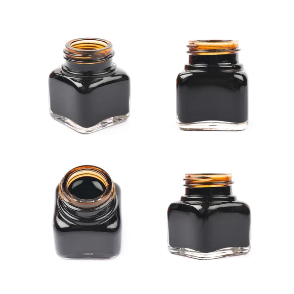 Malé lahvičky naplněné černým inkoustem — Stock fotografie