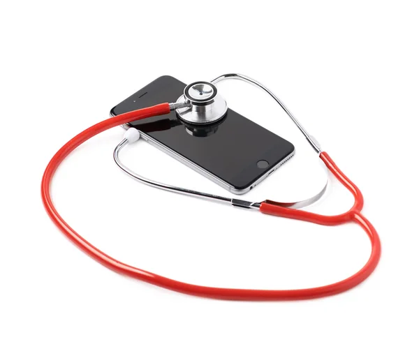 Medical stethoscope over the phone — Stock Photo, Image