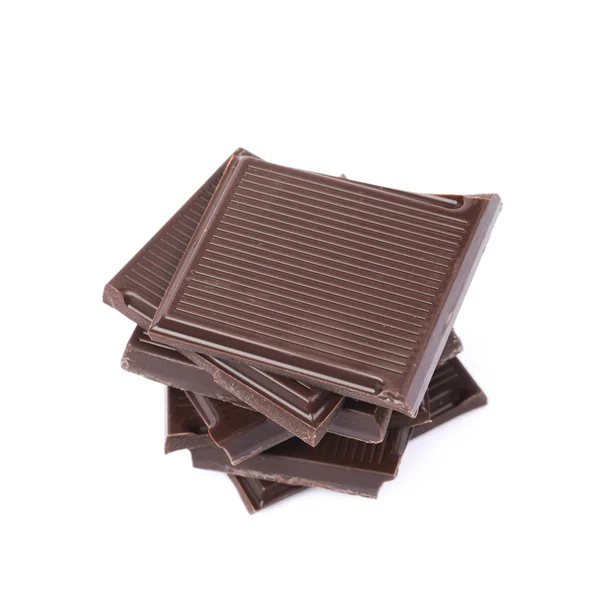 Pile de morceaux de barres de chocolat isolés — Photo