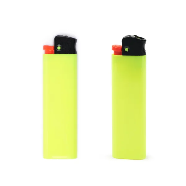 Желтая пластиковая зажигалка — стоковое фото