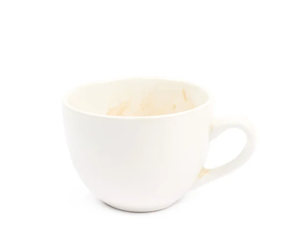 Cup with coffee leftovers isolated — Stock Photo, Image
