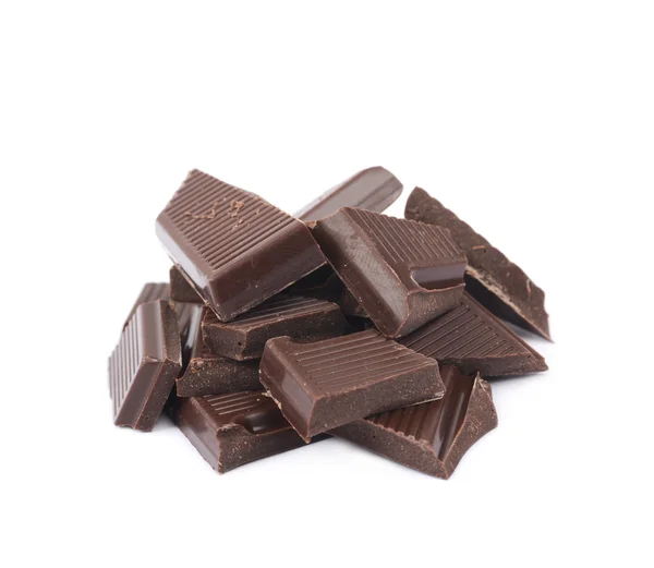 İzole çikolata parçaları yığını — Stok fotoğraf