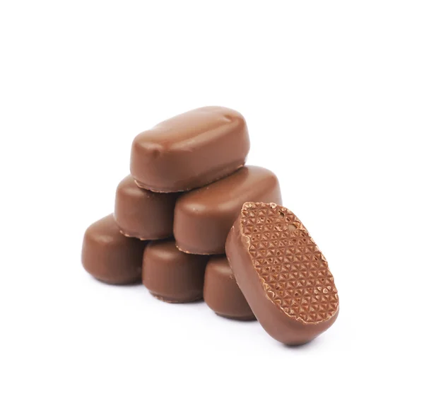 巧克力涂层的奶糖孤立 — 图库照片