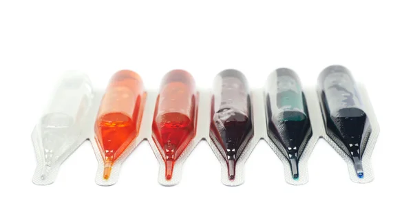 Food dye coloring in a capsule — Stock Photo, Image