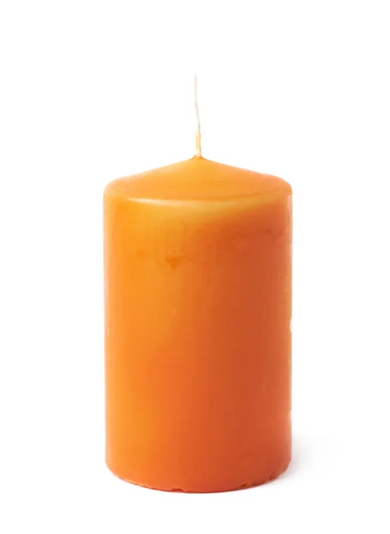 Única vela de cera de laranja isolada — Fotografia de Stock