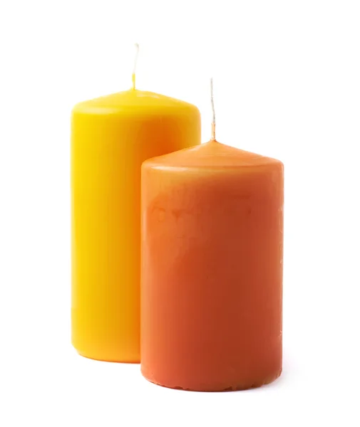 Velas amarelas e laranja isoladas — Fotografia de Stock