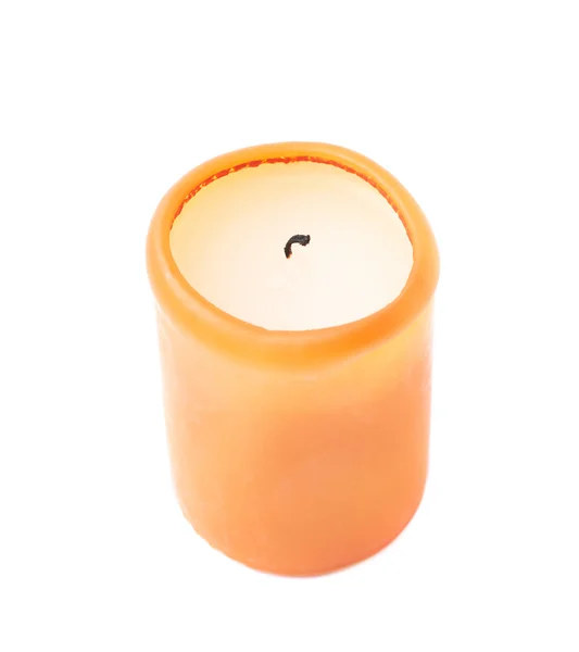 Burned orange candle isolated — Stock Photo, Image