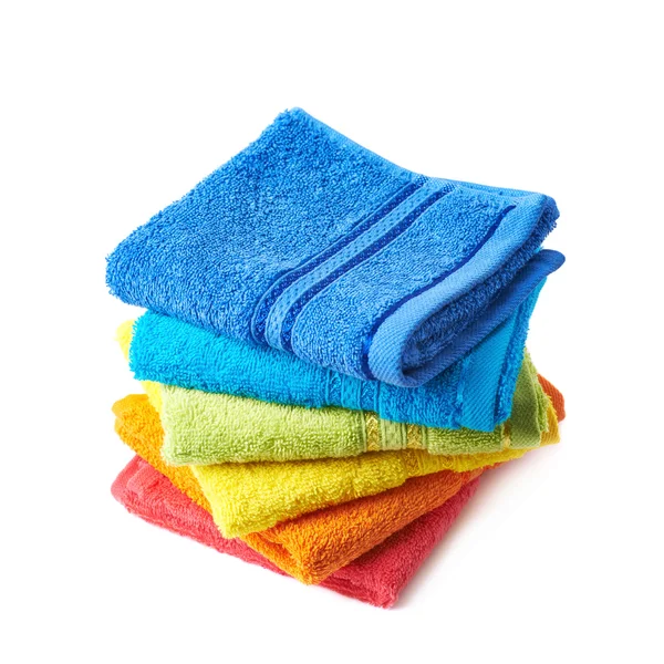 Pile of rainbow colored towels isolated — Stock Photo, Image