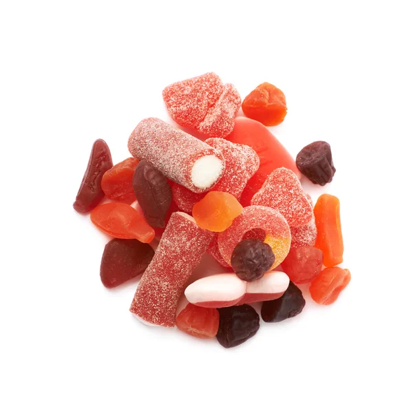 Hromadu červené bonbony, samostatný — Stock fotografie