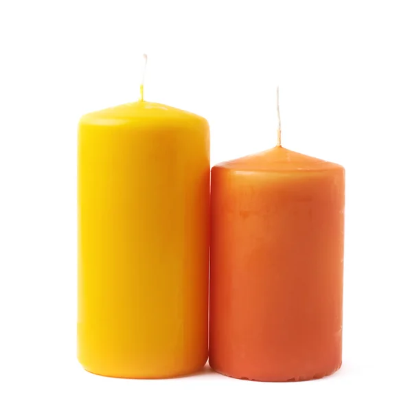 Velas amarelas e laranja isoladas — Fotografia de Stock