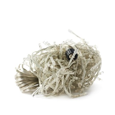 İzole katlanmış ışık garland rulo