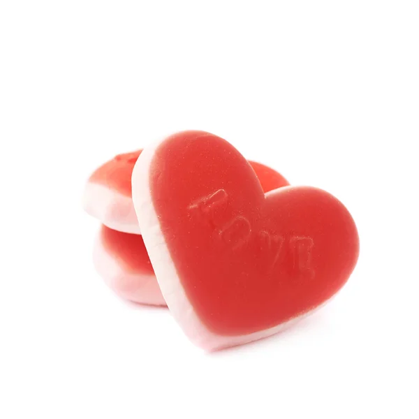 Cukierki do żucia na białym tle w kształcie serca — Zdjęcie stockowe