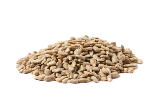 Pilha de sementes de girassol isolado — Fotografia de Stock