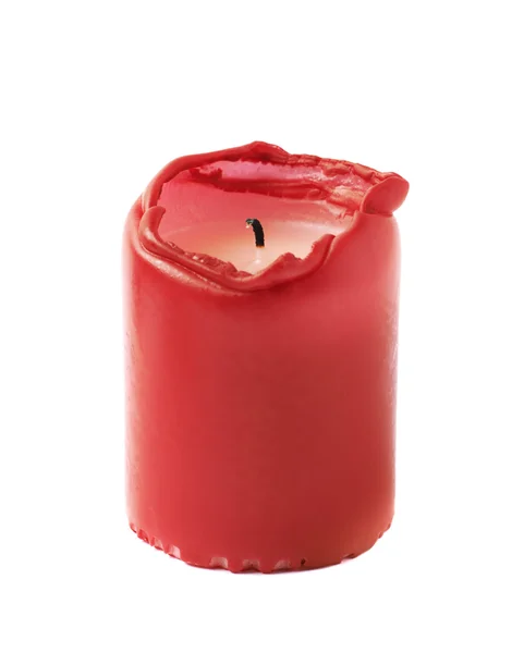 Напівспалена червона свічка ізольована — стокове фото