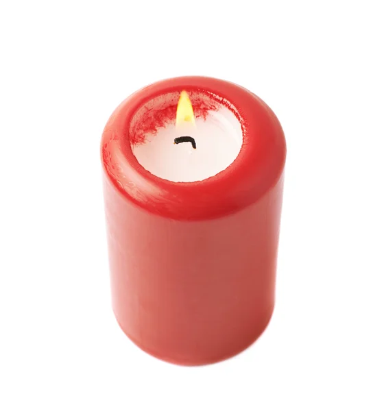 Queimando vela vermelha isolada — Fotografia de Stock